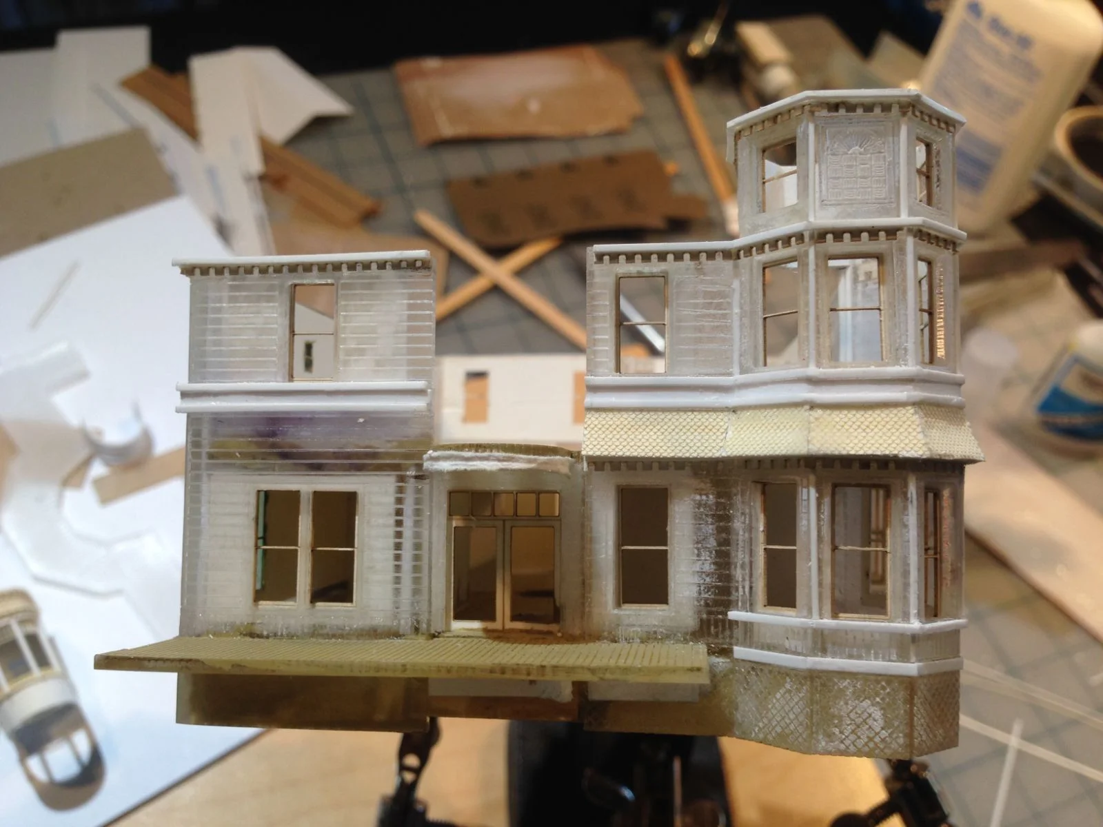 Each building model was drafted using CAD software from measurements made on site or from historical photographs. The models were constructed using laser cutting and etching on 1/8th inch thick sheet acrylic, then assembled by hand, detailed, painted and weathered to look like the real thing.
