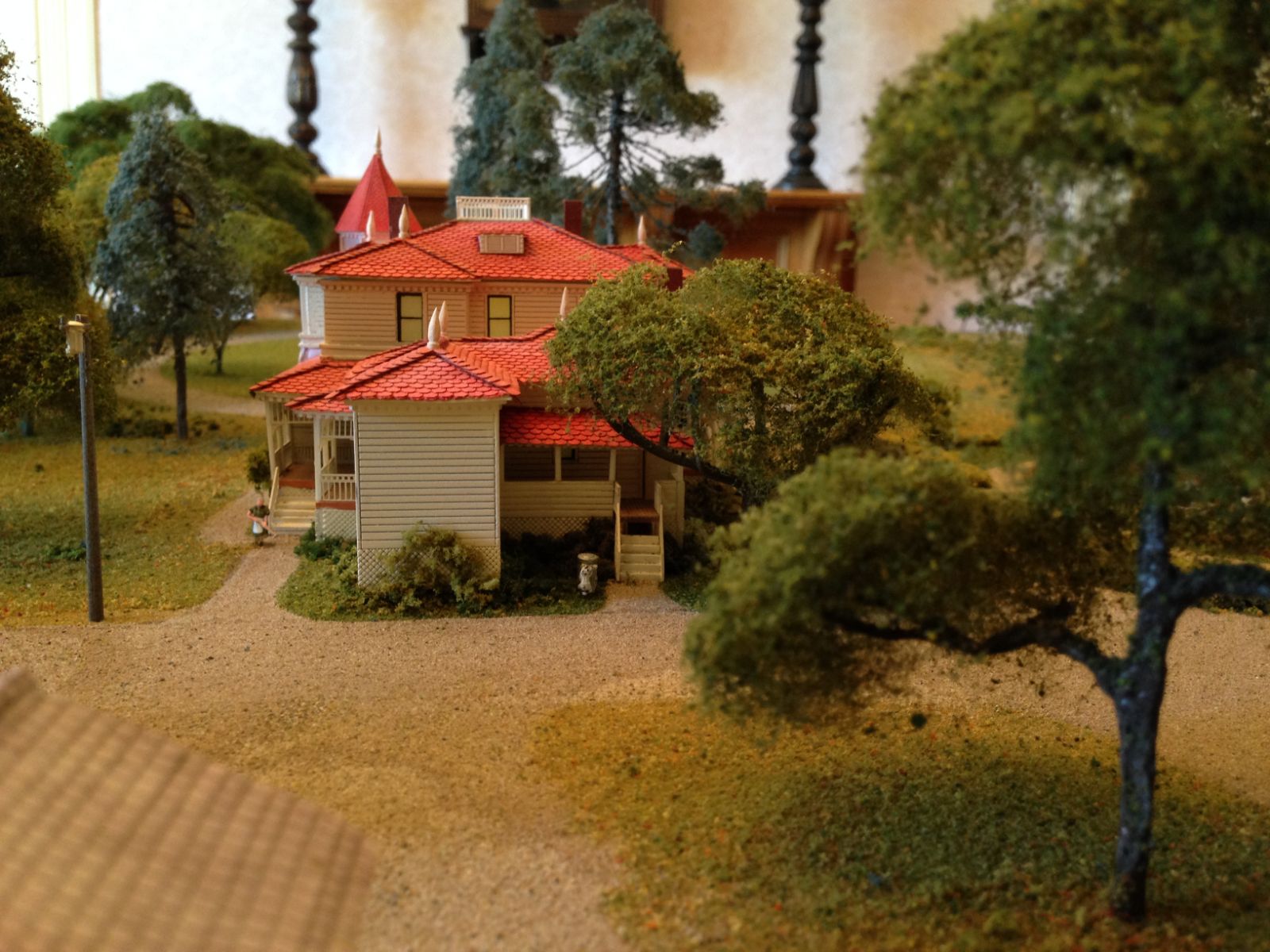 Small details like trash cans and gardening tools add to the overall scene.