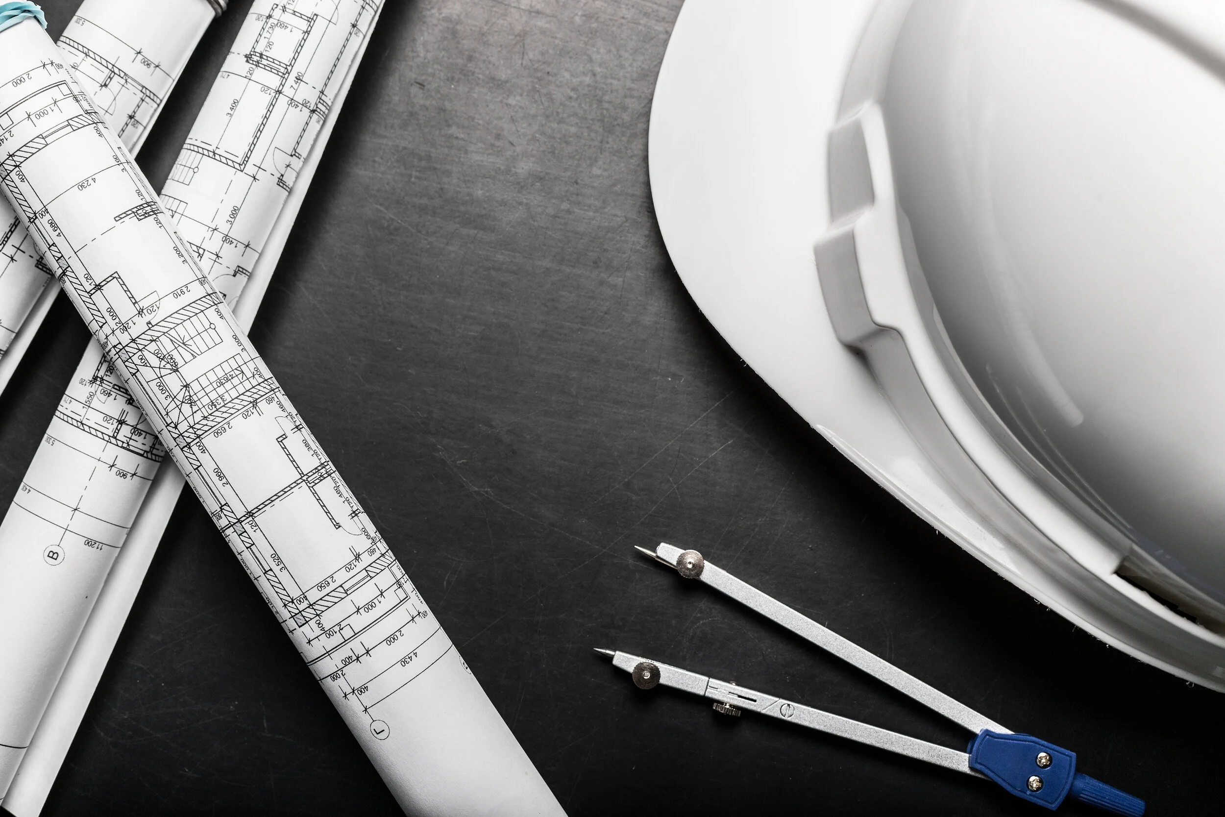 bigstock-Construction-Planning-Drawings-253929085.jpg