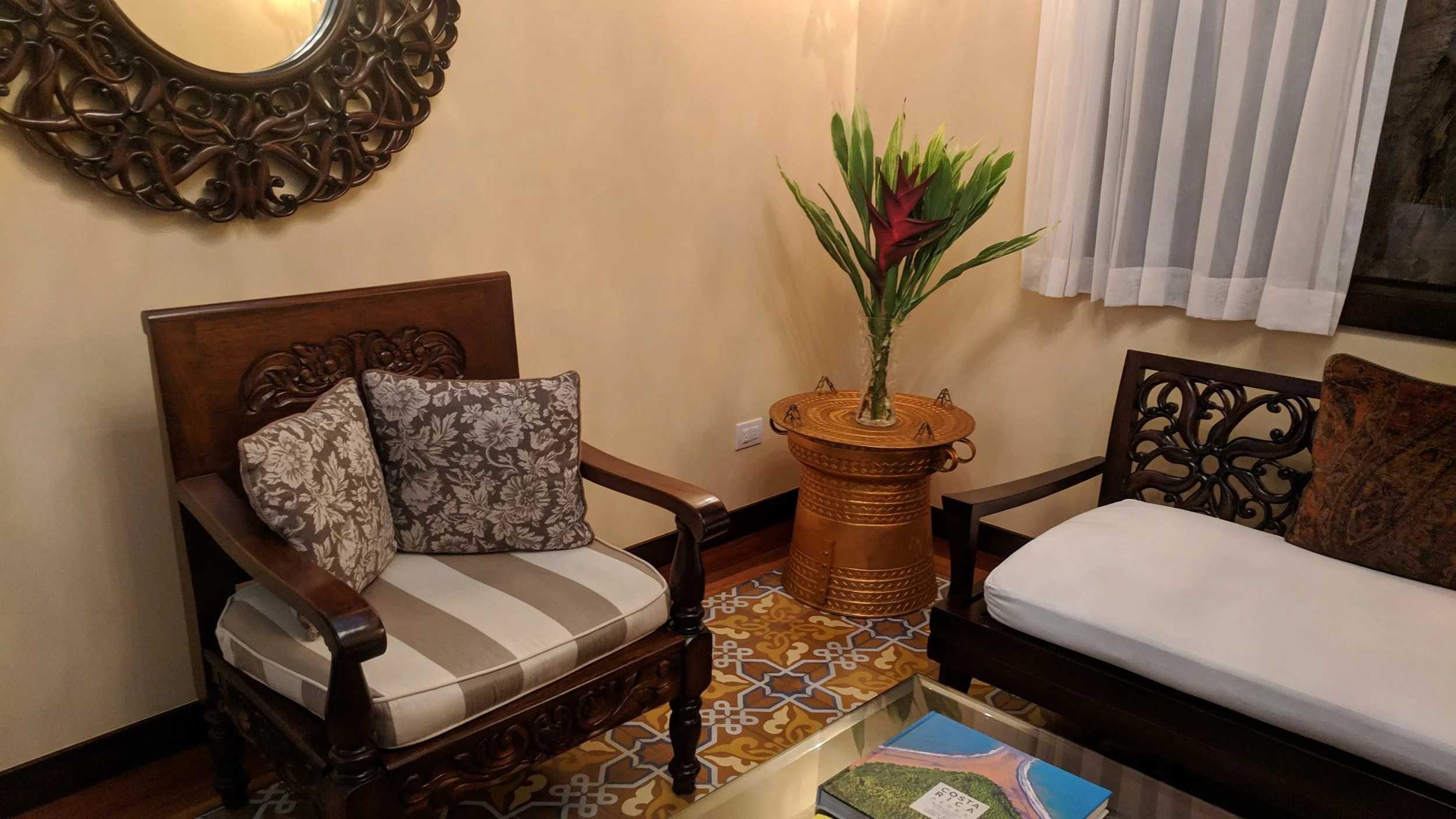Some seats for lounging, eating, or watching TV in the room.
