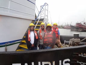 Students gather on deck of the training ship