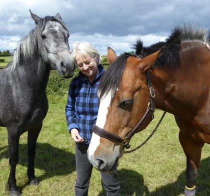Deirdre and horses.jpeg