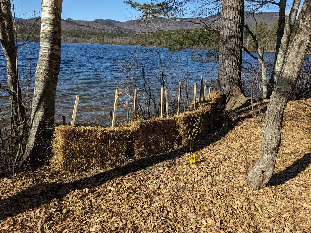 Best Management Practices for keeping sediment out of the lake during the project included hay bales, and...