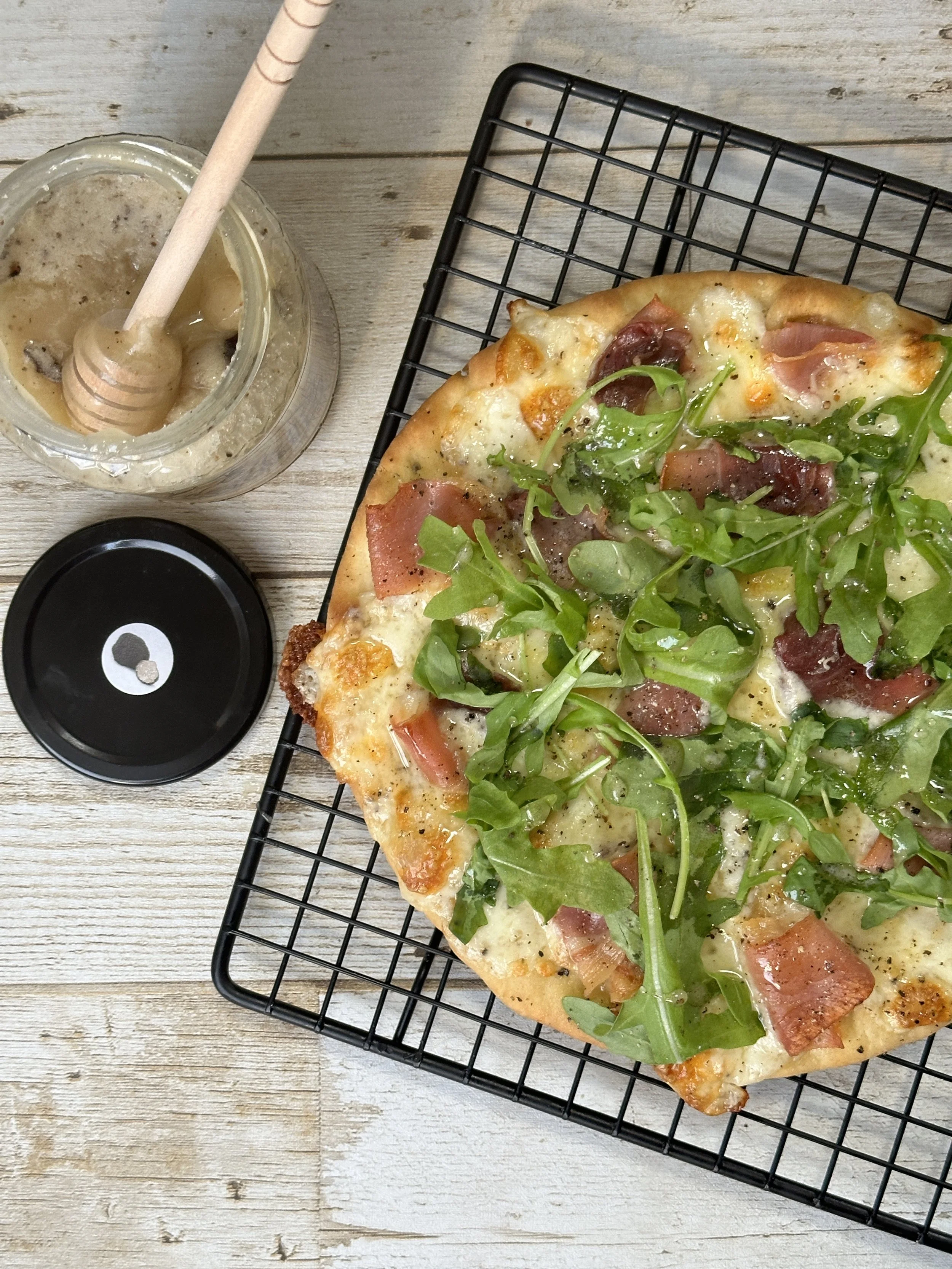 Prosciutto Arugula Truffle Honey Flatbread