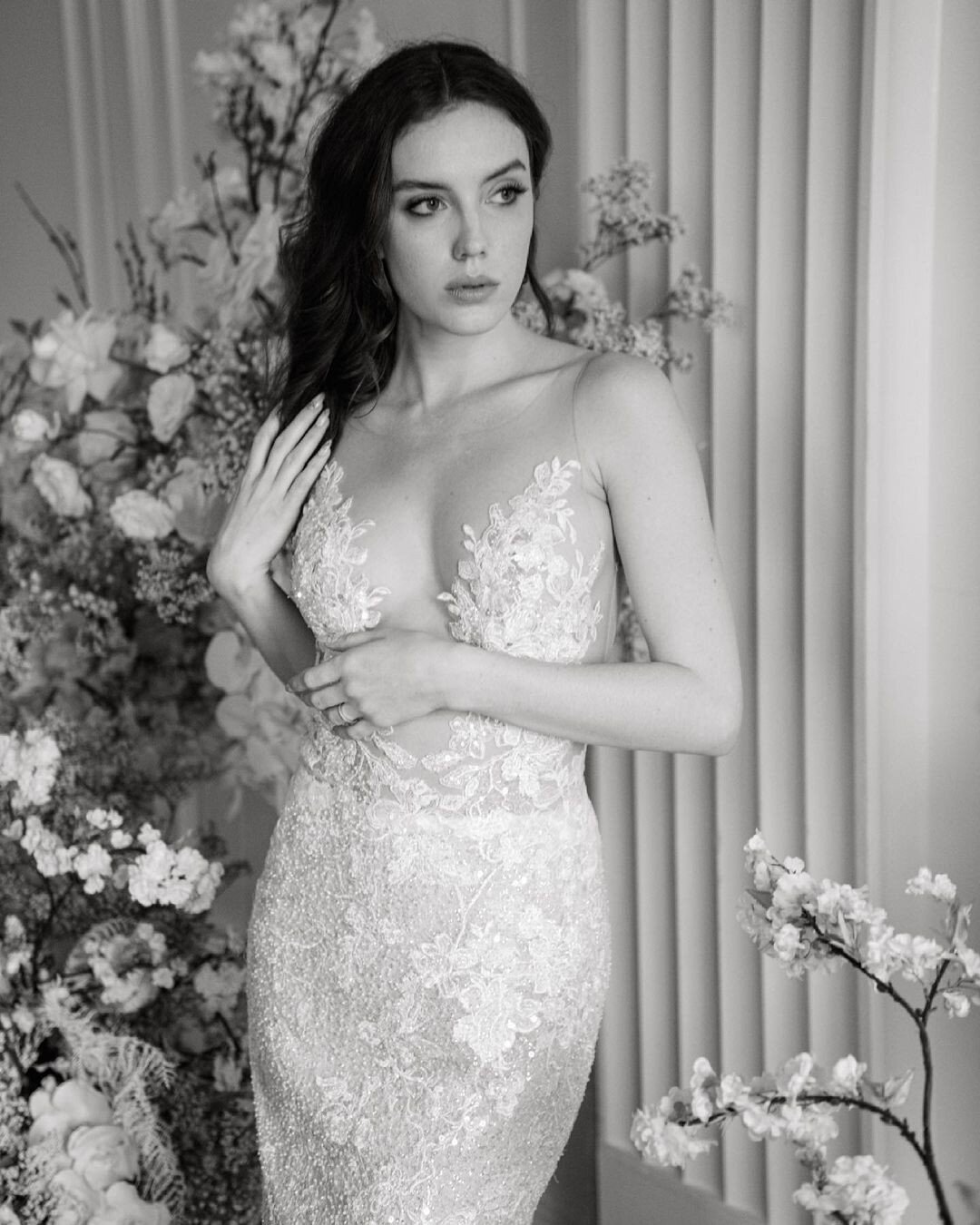 A little bit of lace...A LOT of drama 😎🌙
Would you saunter down the aisle in &quot;Sanibel&quot;?

Credit:
photography: @aseaoflove 
hmua: @helloflawlessartistry 
florist: @billieballco 
nails: @sarahnailsit