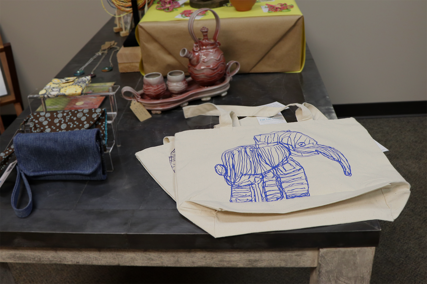 Roxie Tomek’s “Baby Elephant” tote bags for sale at the St. Louis Artists’ Guild!