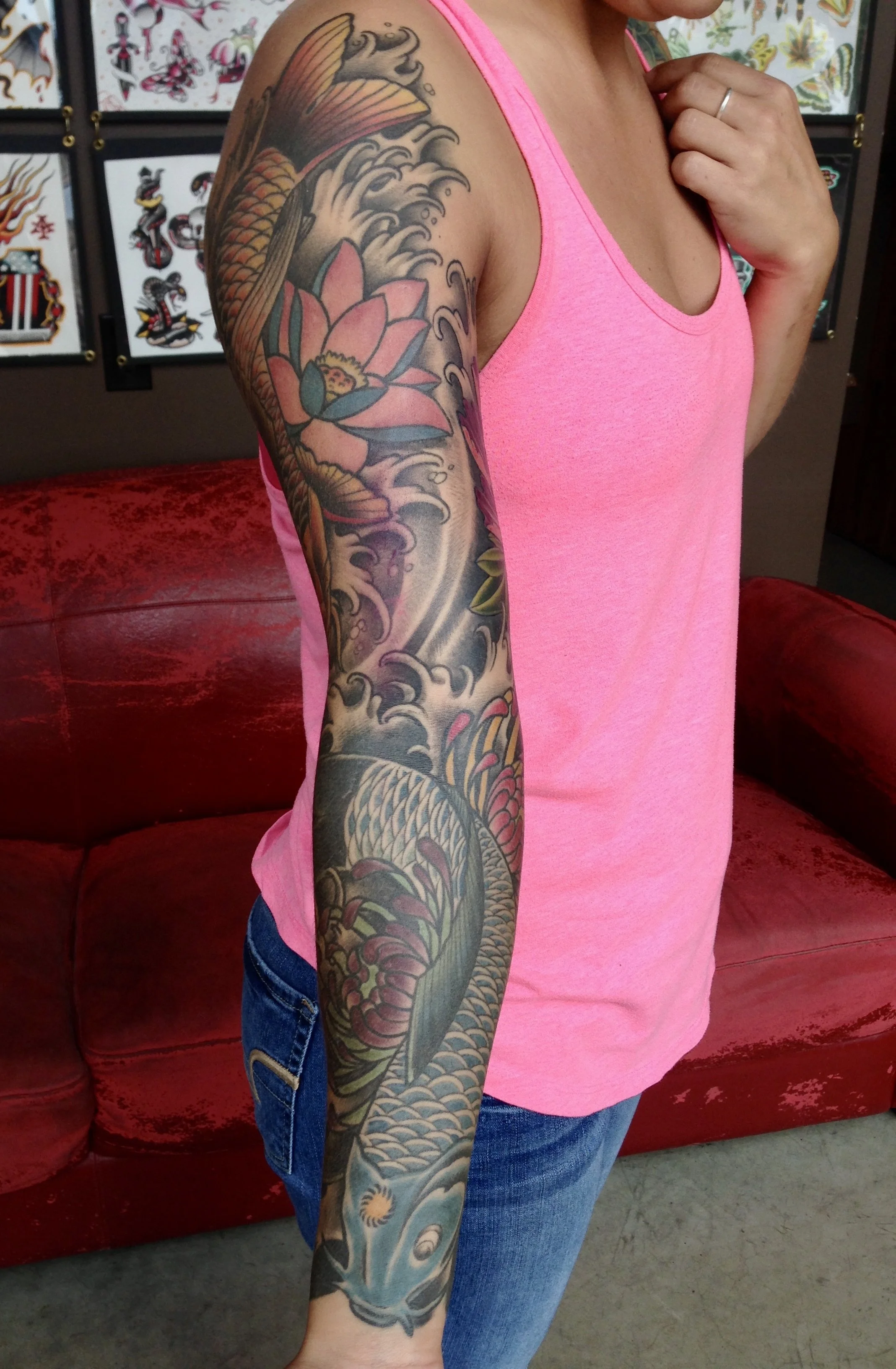 Healed Japanese koi fish sleeve tattoo.