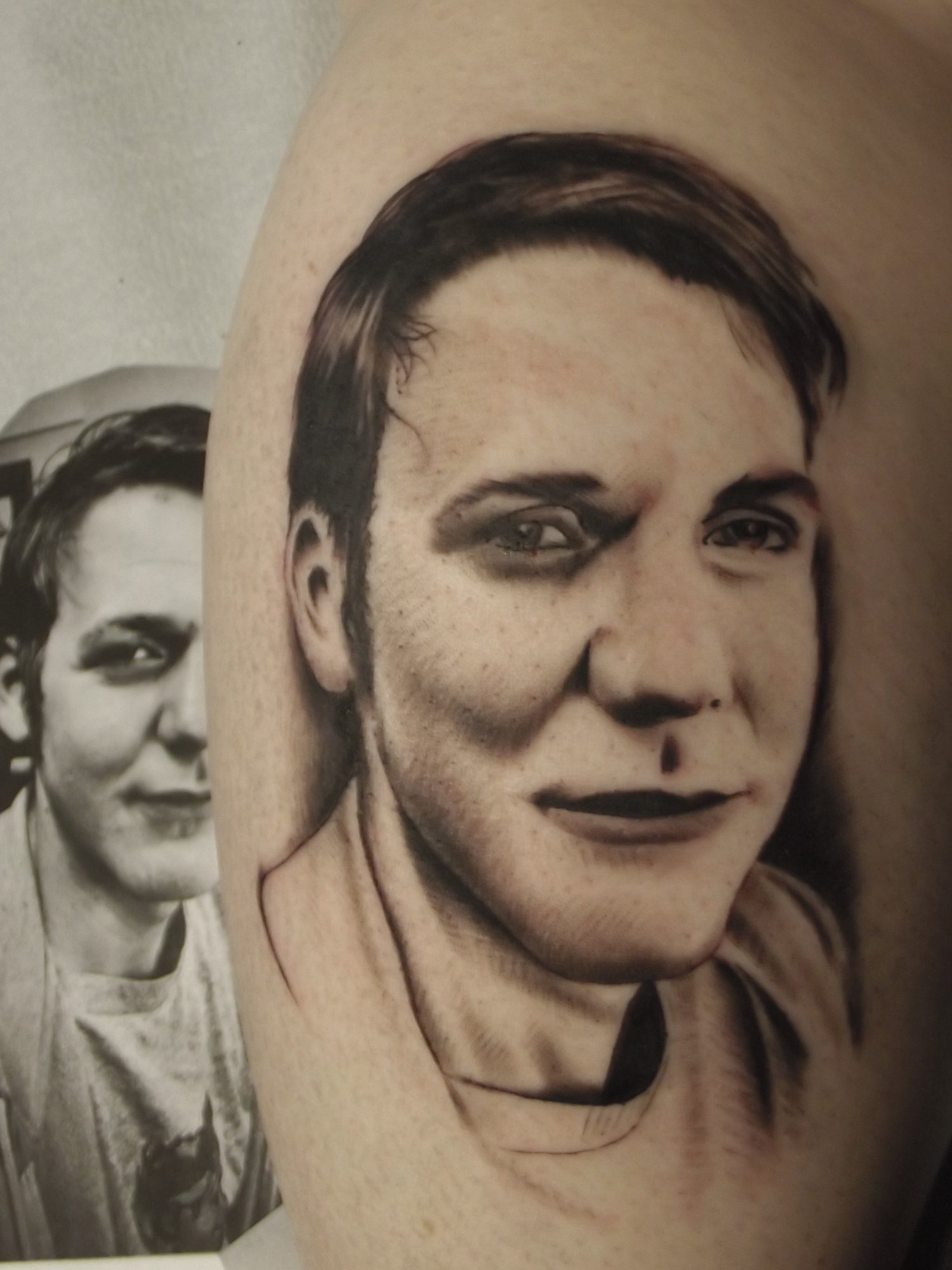 Black and Grey portrait tattoo.