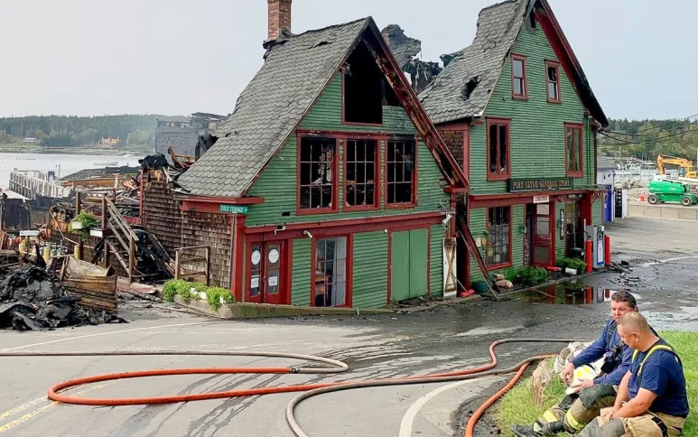 Colby College to rebuild fire-destroyed Port Clyde wharf this summer