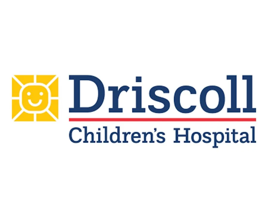Logo of Driscoll Children's Hospital with a smiling sun image and hospital name in blue and red text.