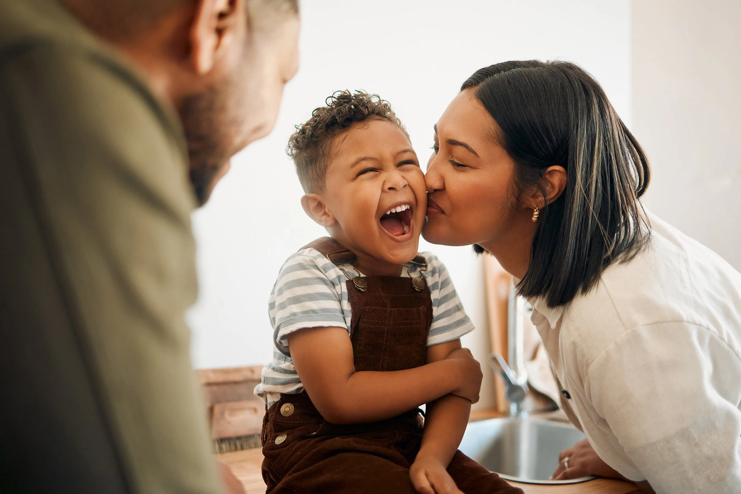 Happy parents and child together