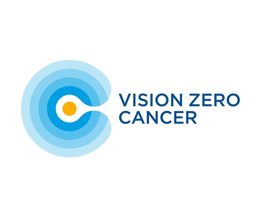 Logo for Vision Zero Cancer, featuring a stylized eye with concentric circles in shades of blue and a yellow center, with the text 'Vision Zero Cancer' in blue.