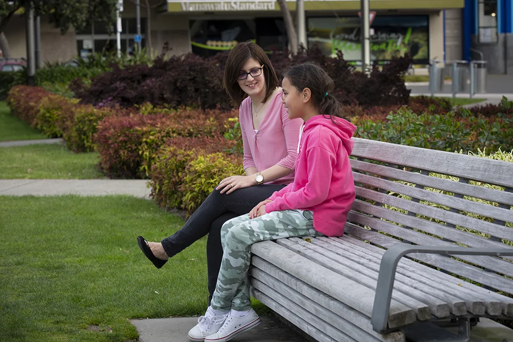 BigSisters-sit-in-park.jpg