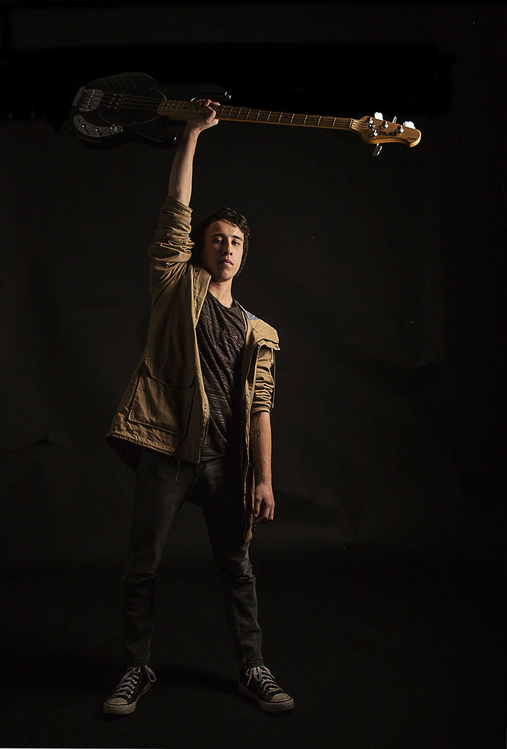 Brad-holding-guitar-above-by-Isaac.jpg