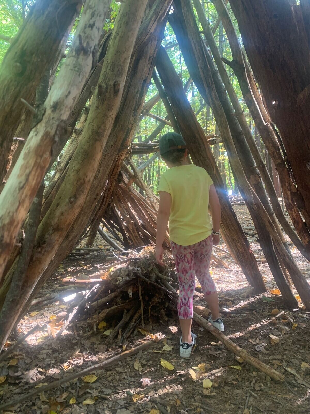 jesses kid under tree branches .jpeg