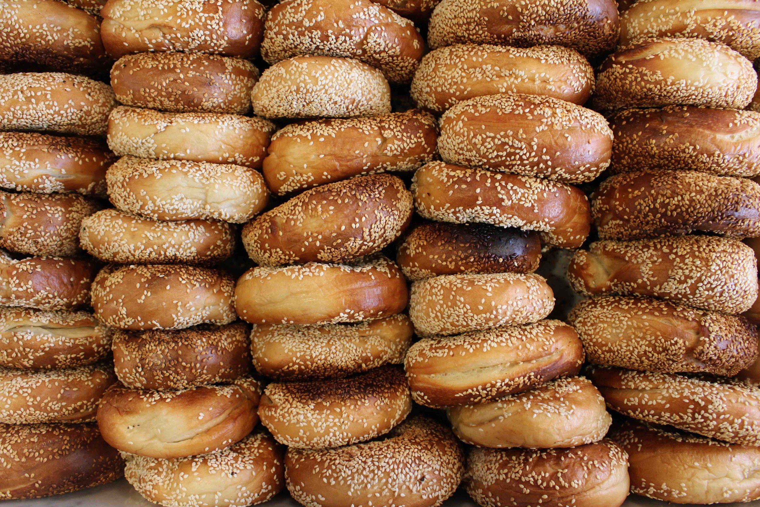 overhead shot of bagels in rows 