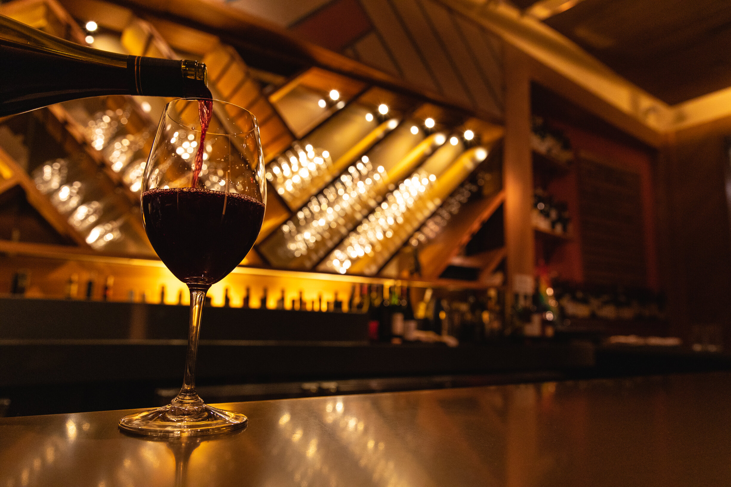 wine glass sitting on bar 