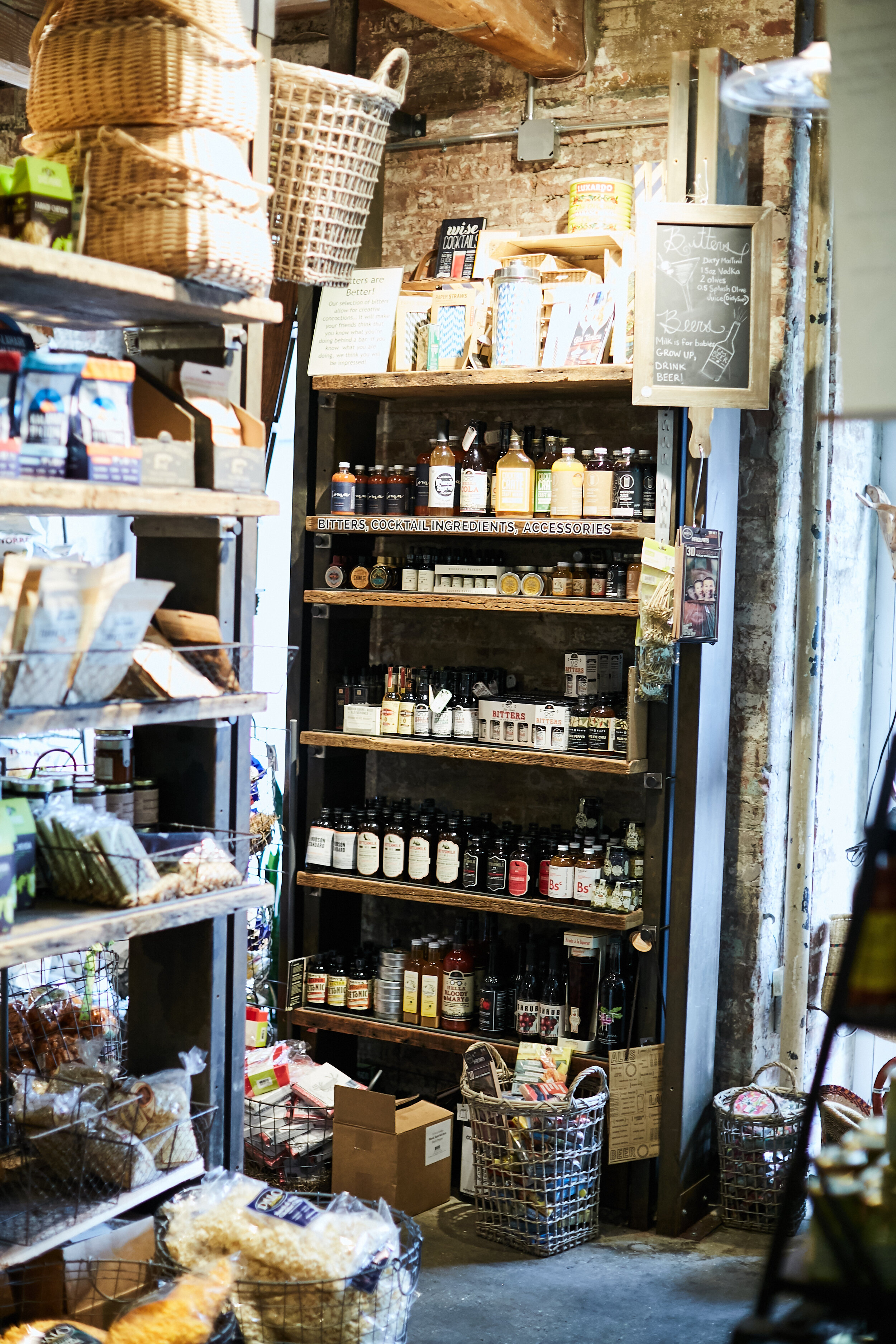 wooden shelving holding soaps and baskets 