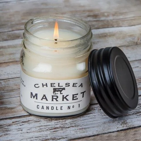 Chelsea market Cutting Board with a red pepper being sliced