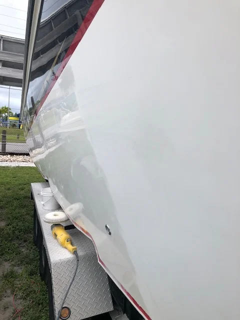 Boat exterior being professionally cleaned