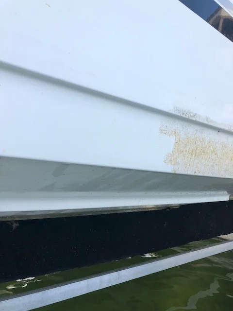 Boat hull being cleaned and polished