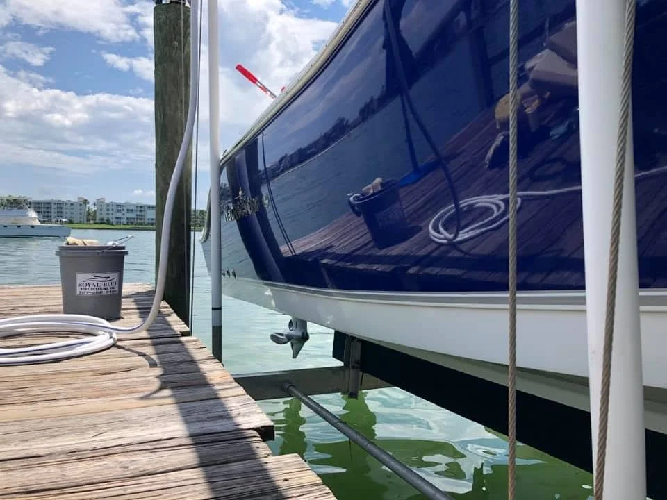 Boat hull with restored glossy finish