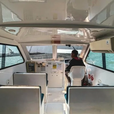 Clean boat interior with vinyl seating and marine dashboard