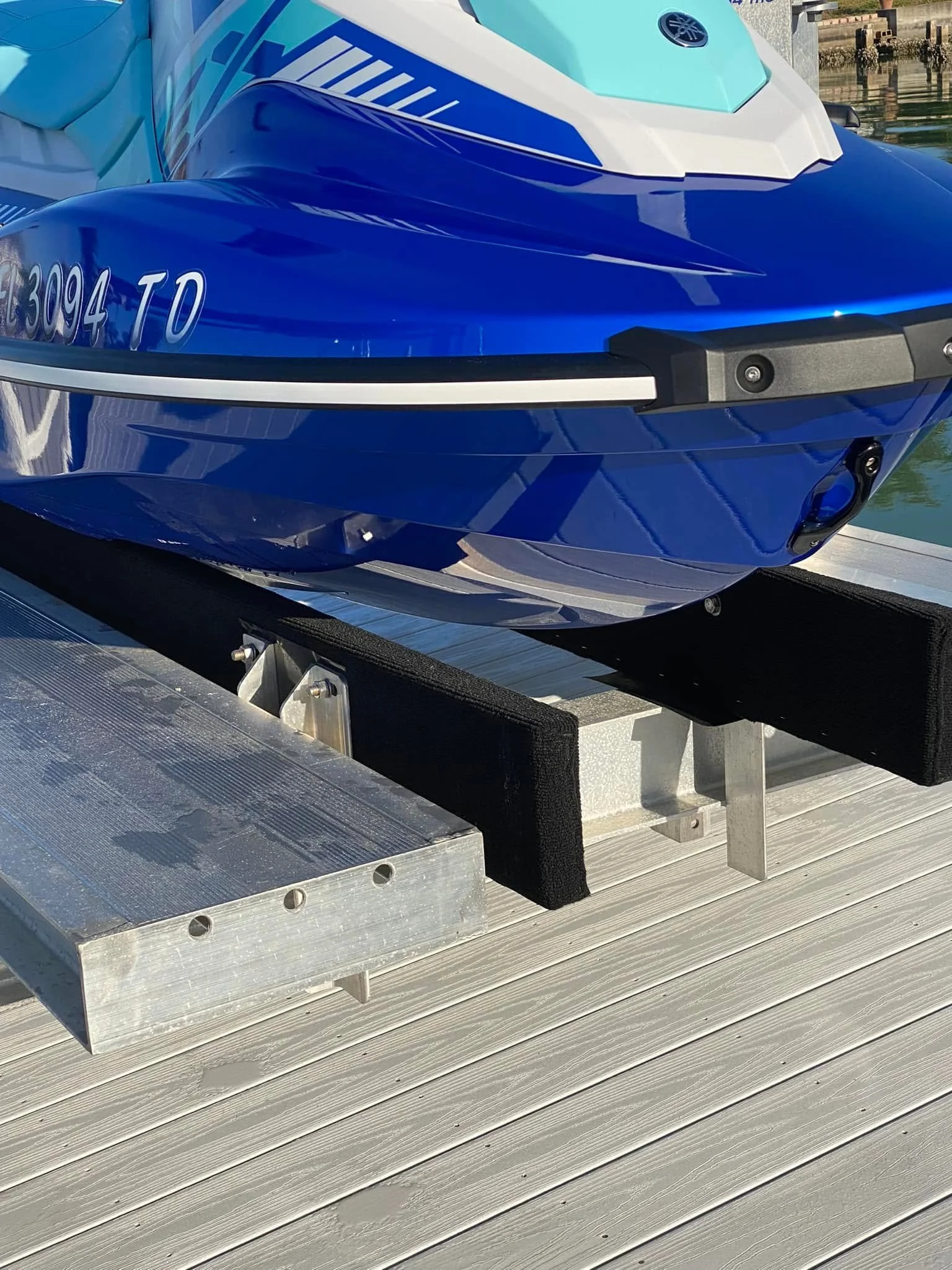 Blue boat with freshly waxed hull