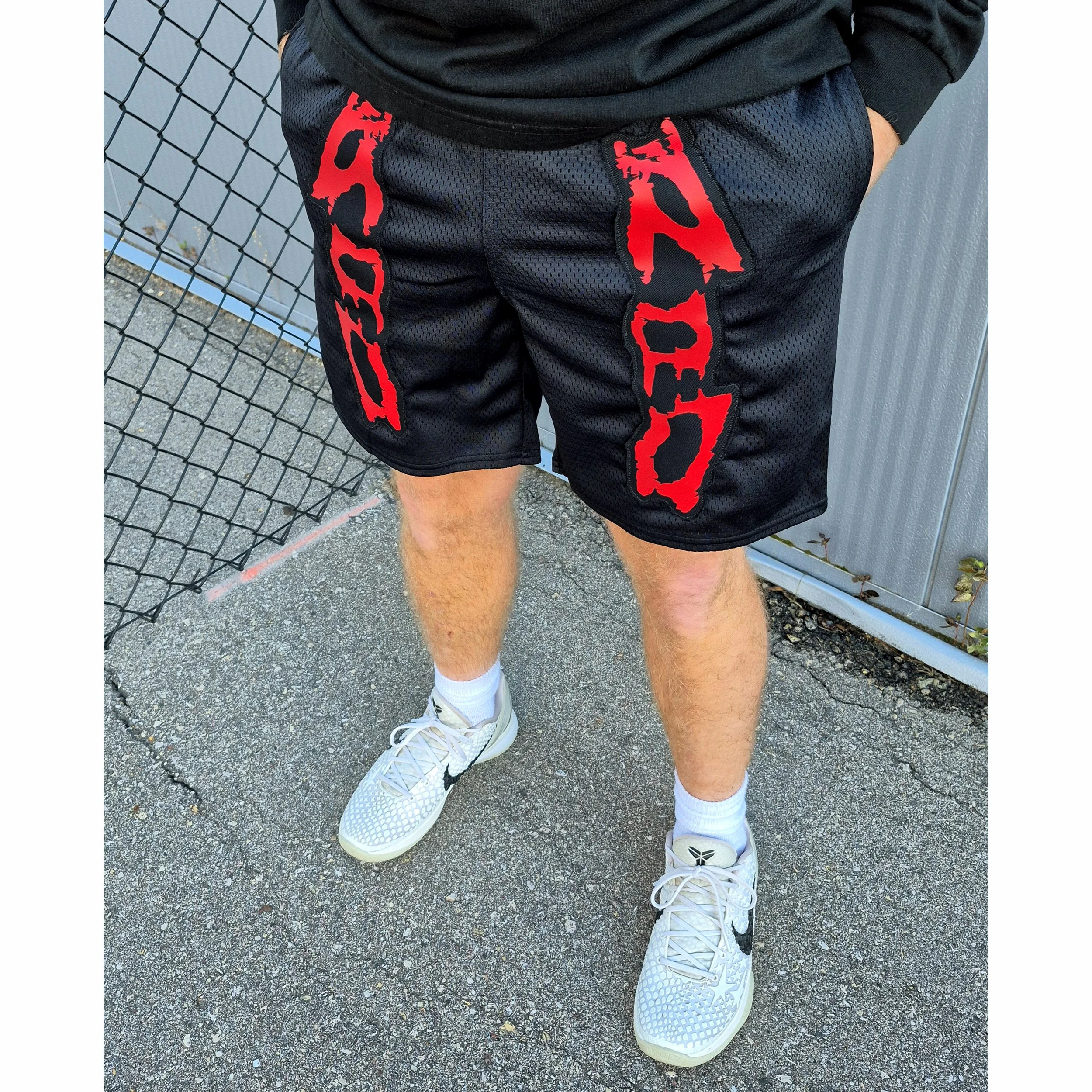 INVASIVE SHORTS MODEL SHOT.jpg