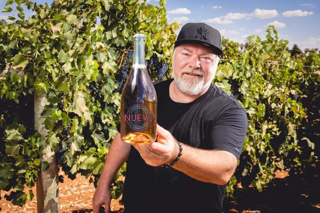 Thirsty work! Kyle Sandilands 'develops fruit-infused wine product' 