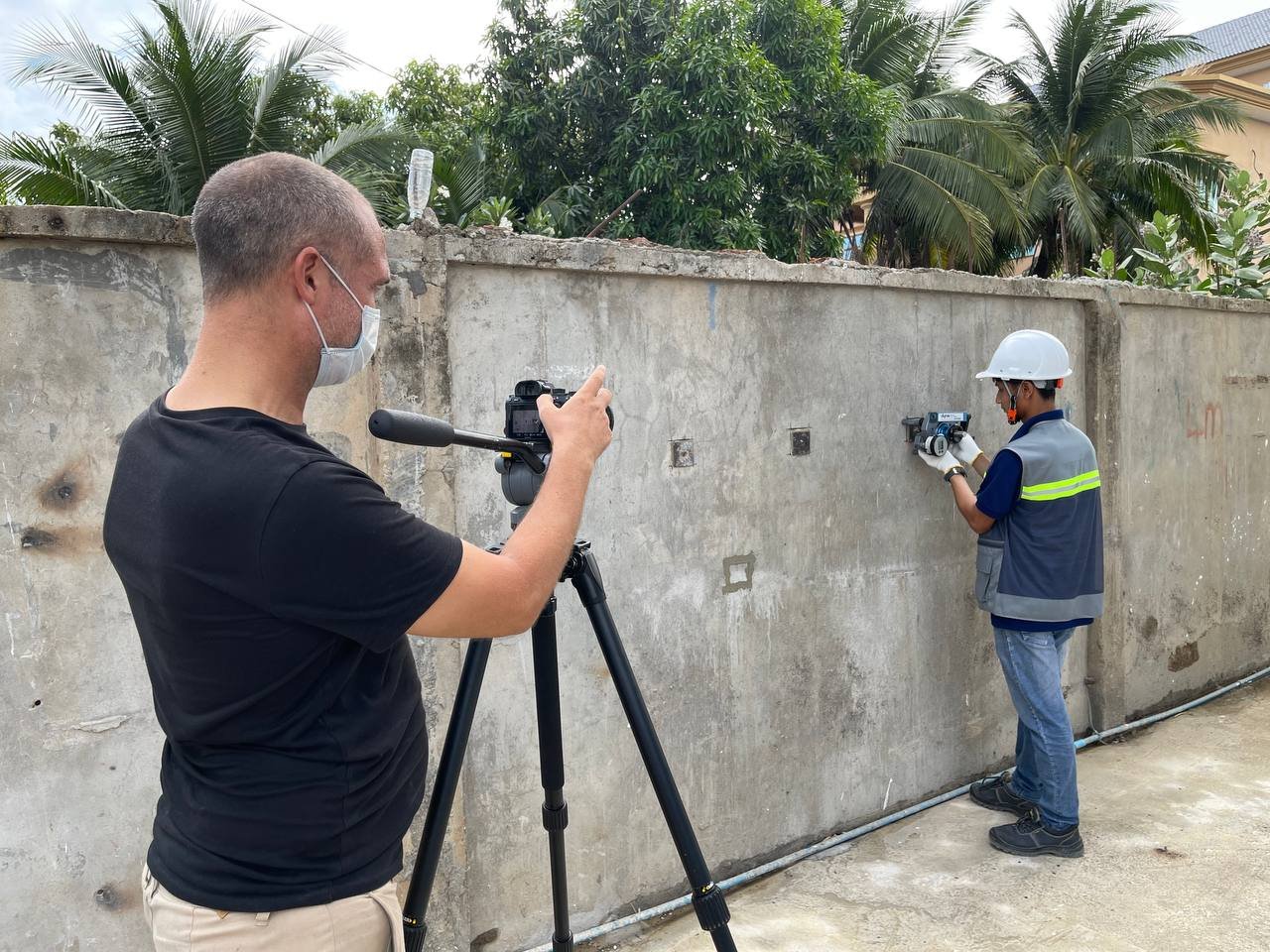 George filming a render test outside BECL offices in Phnom Penh