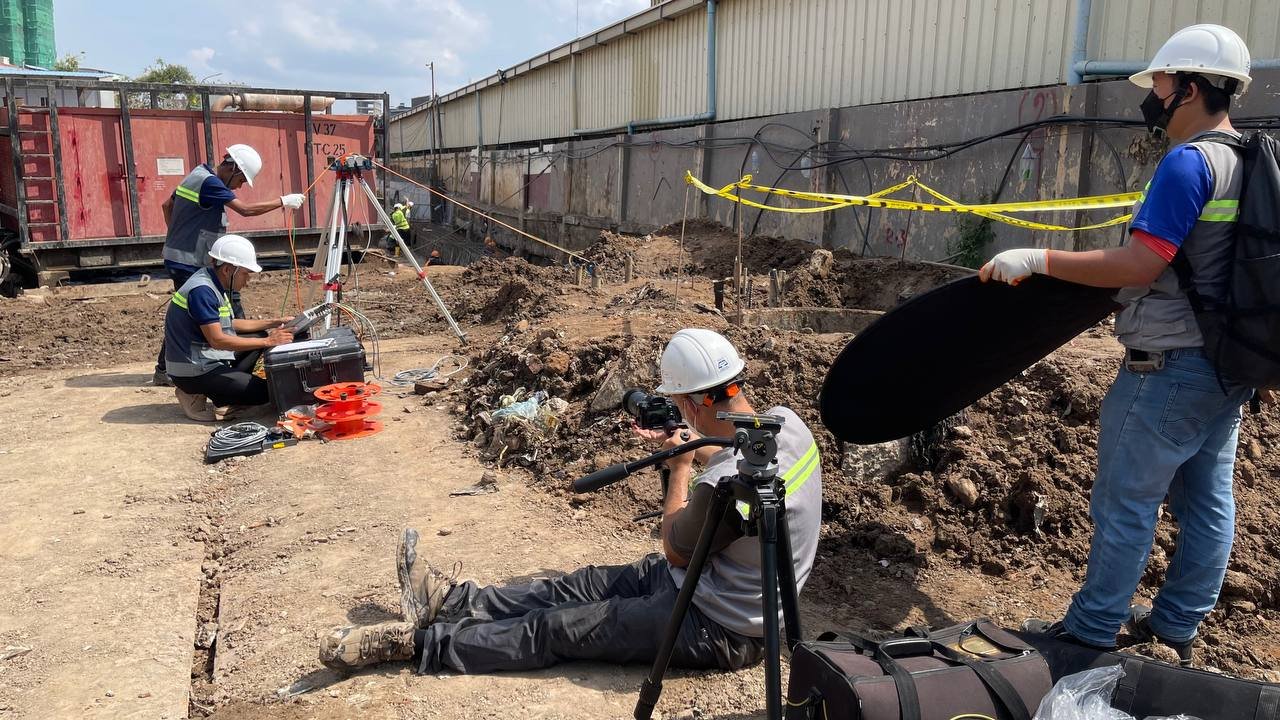 Lighting and filming 2 engineers conducting tests on a building site in Phnom Penh for a corporate video