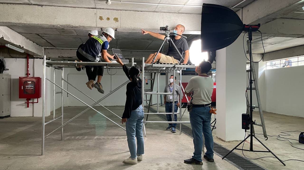 George lighting and filming 2, BECL employees testing a concrete beam