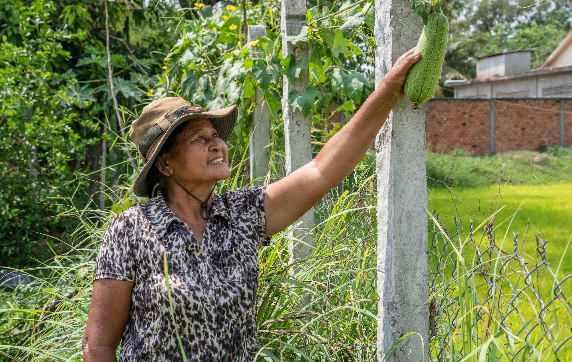 Rim Ren tends to her farm. The photo was taken in Siem Reap when working as a photographer and videographer for the NGO Kiva