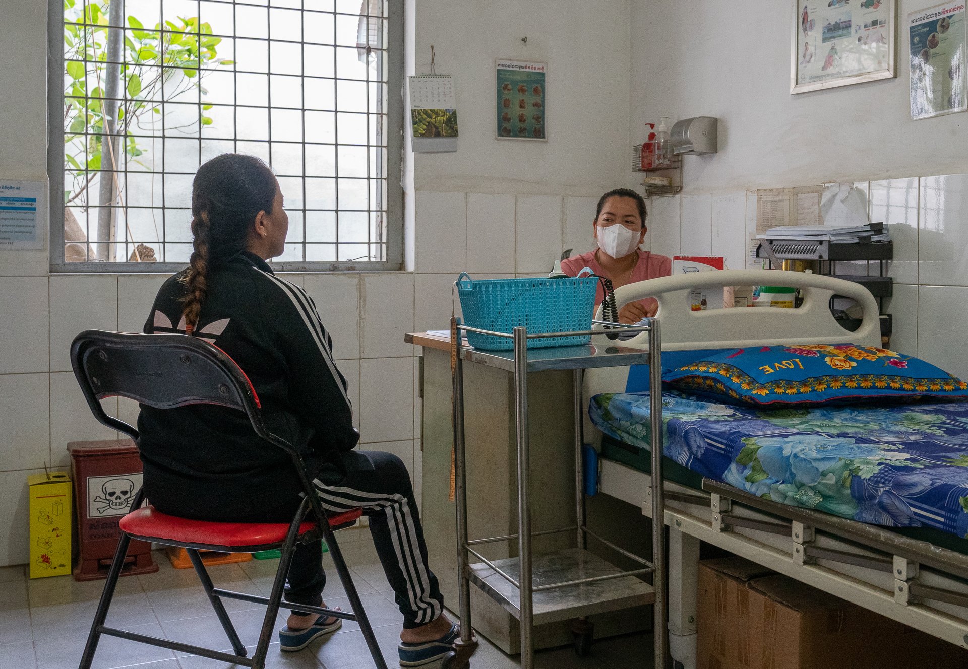 Sok Voeun having an appointment with the nurse at the healthcentre