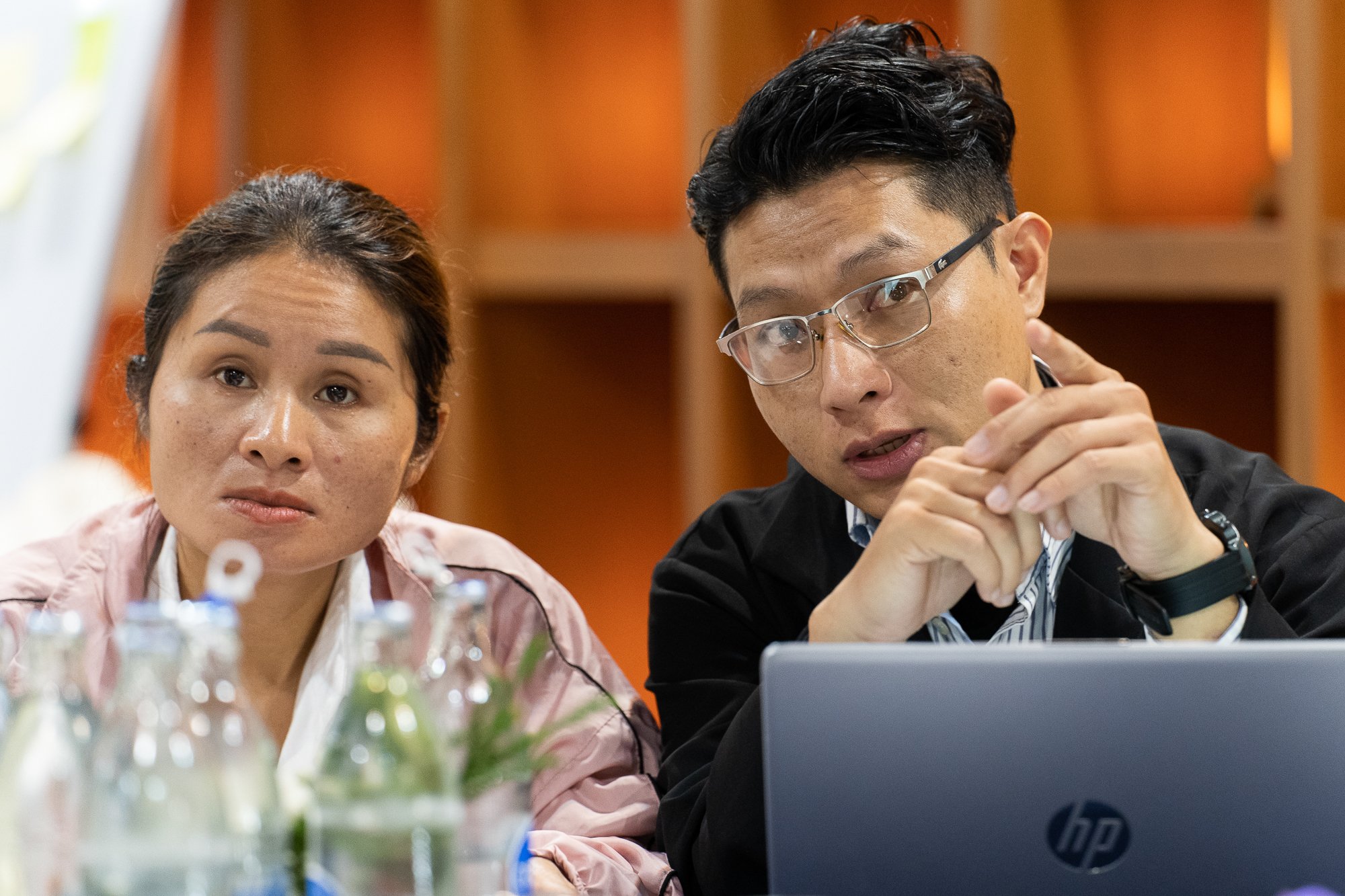Vietnamese participants listen to a presentation