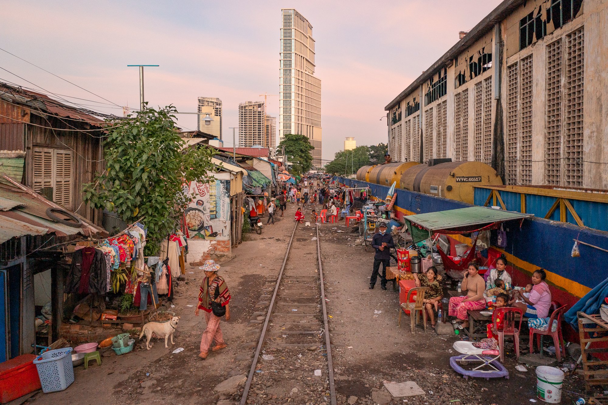 An aerial video looking down the railway tracks in Phnom Penh to the east. People live their lives along the tracks.