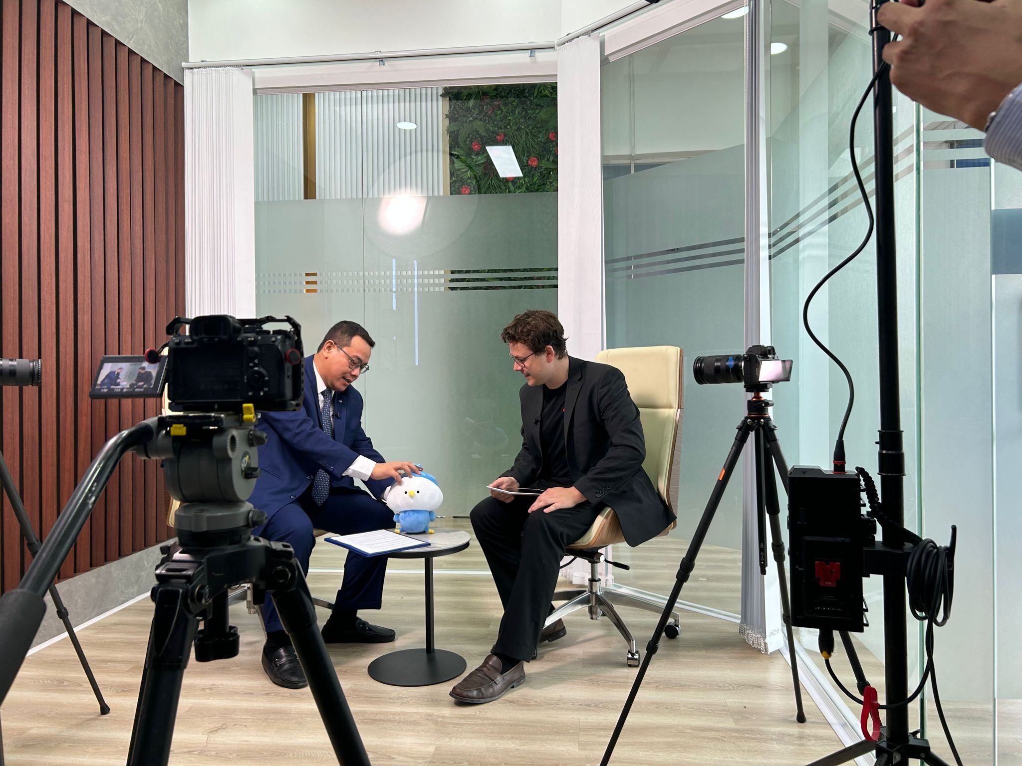 an image of the camera and lighting set up for a corporate interview