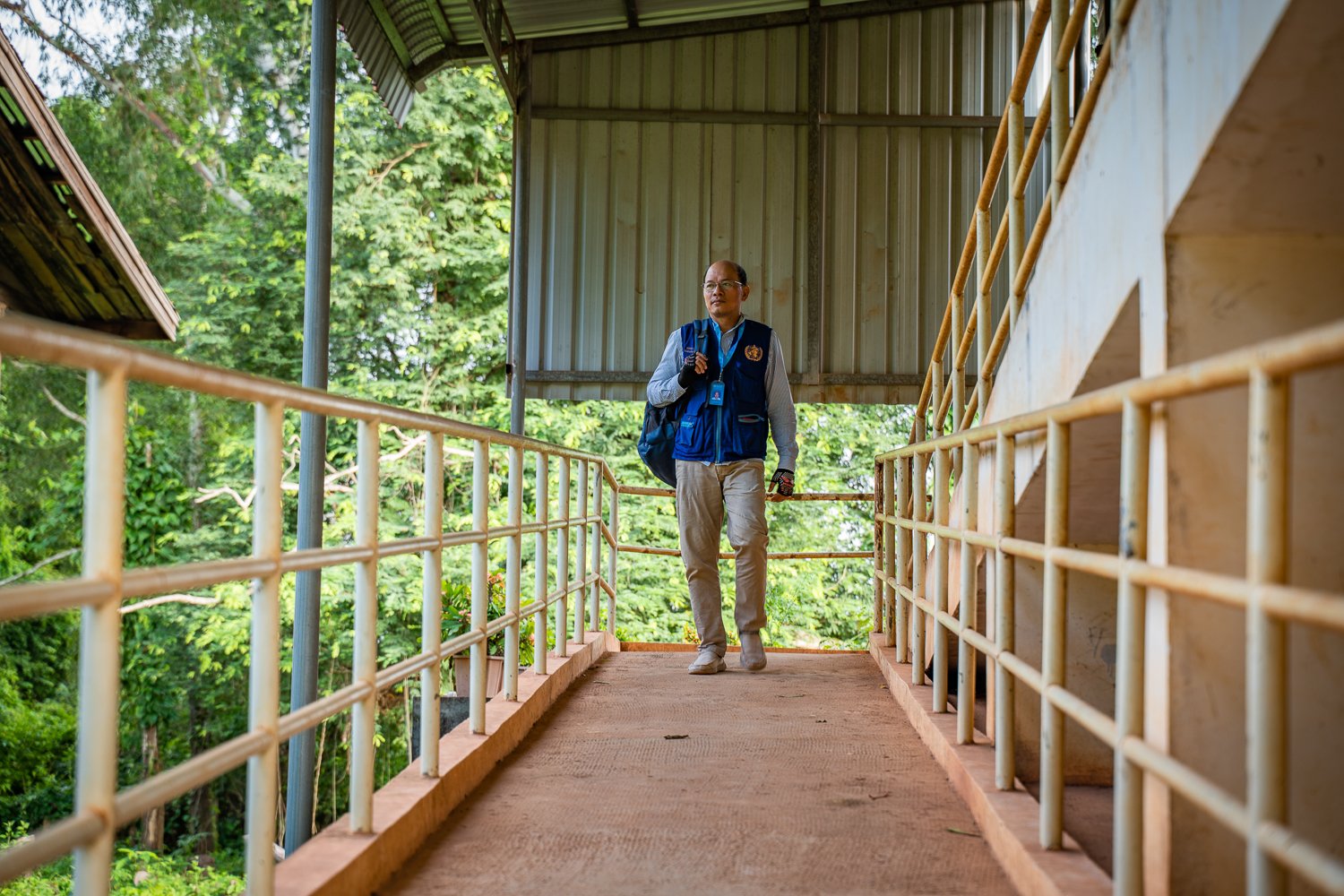 Sophal leaves Siem Pang Health Center to go on a community visit