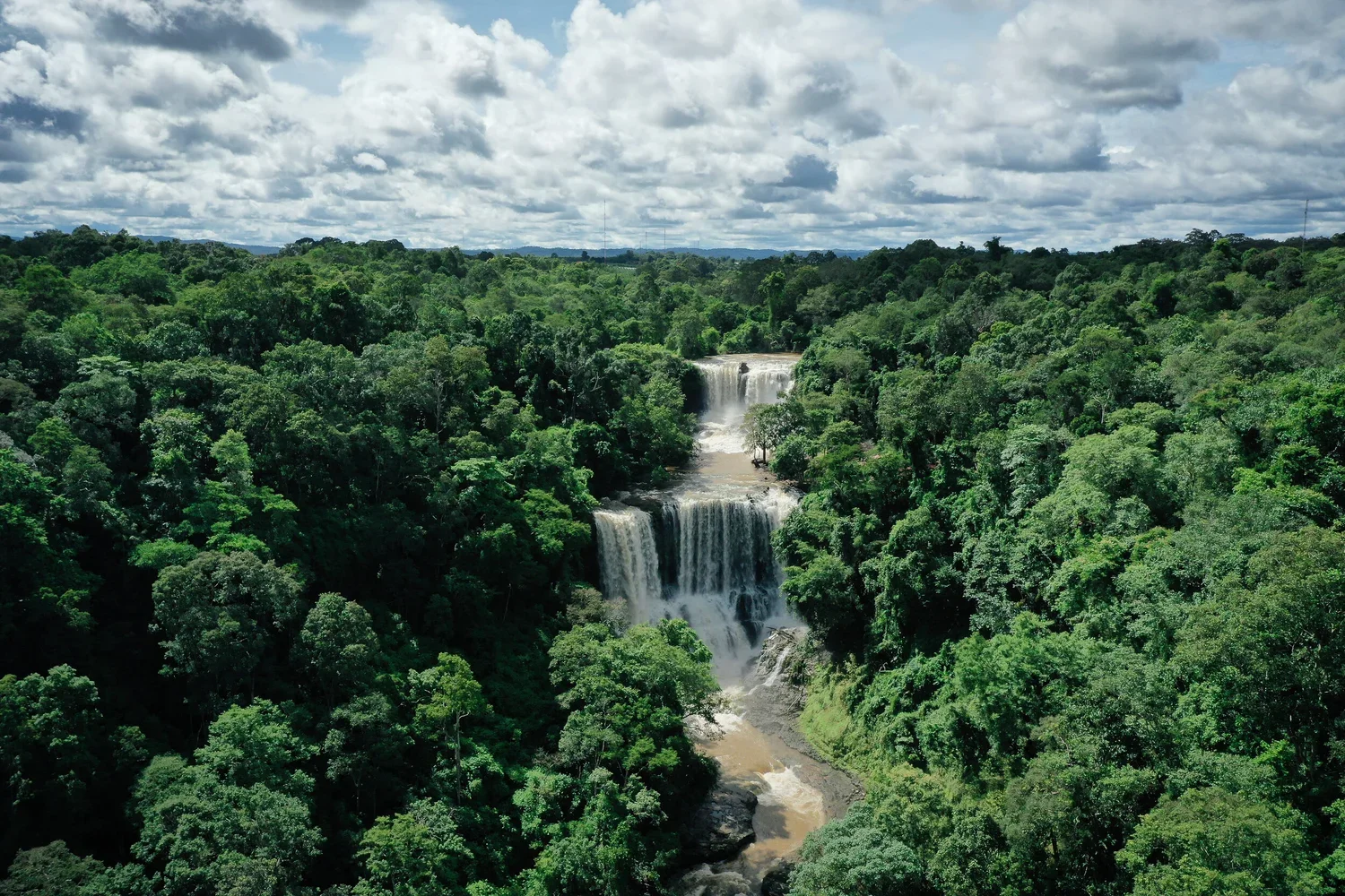 aerial-drone-waterfall-jungle-mondulkiri-cambodia.webp