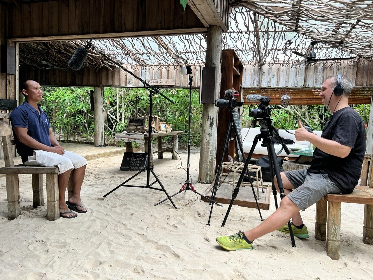 George Jefferies interviewing Sideth Chun, community liaison officer at the Song Saa Foundation, at the Discovery Centre, Cambodia