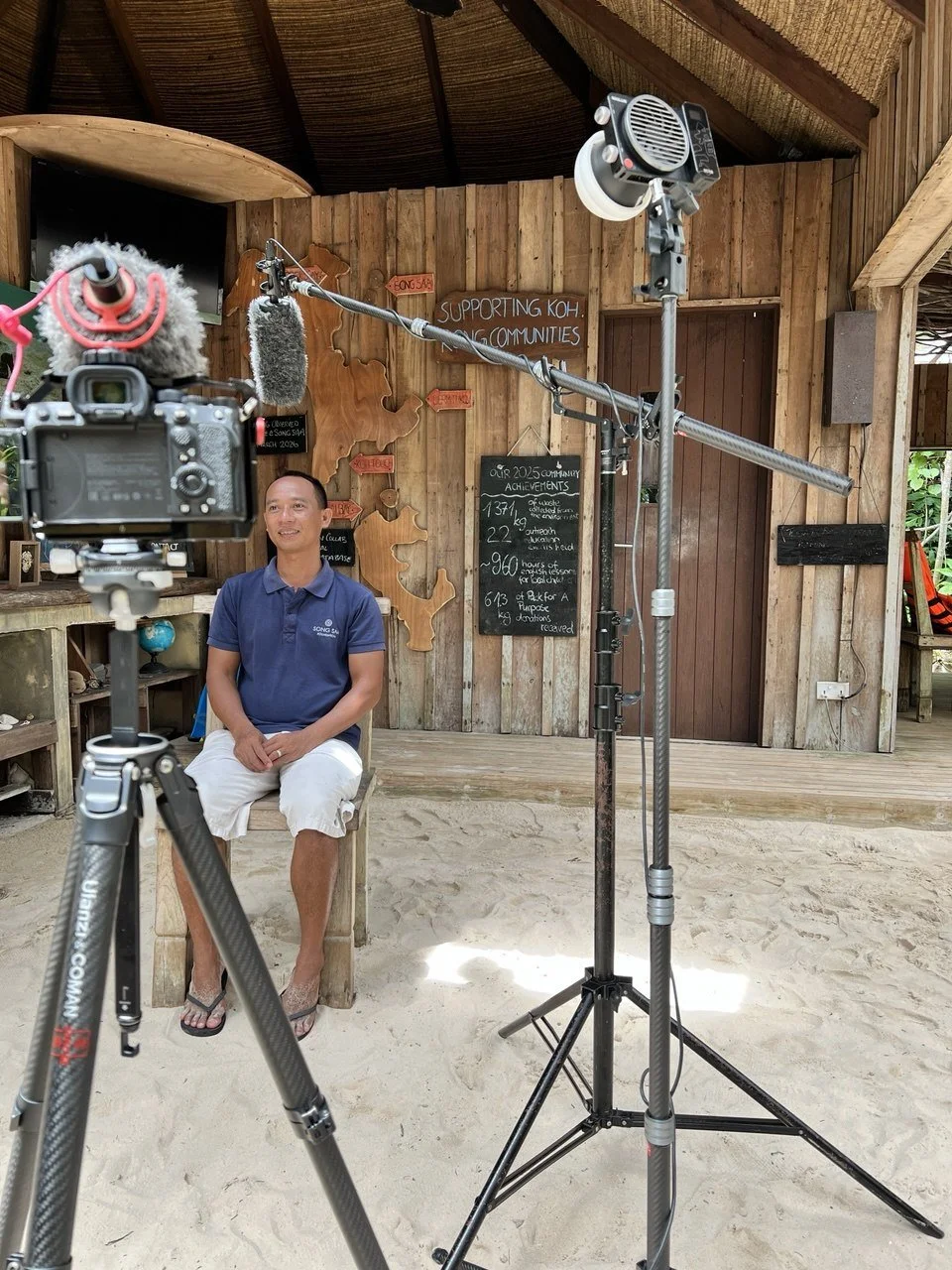 Two-camera interview setup with a Zhiyun Molus X100 light and boom mic for Sideth Chun at the Song Saa Foundation Discovery Centre, Cambodia