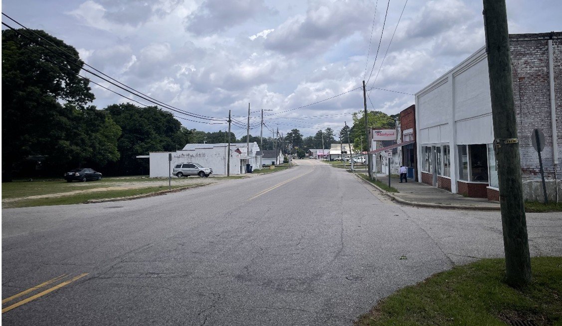 2026 photo looking at Downtown Sims from corner of Main Street and Wall Street
