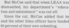 Newspaper clipping about Police Department Funding Cuts