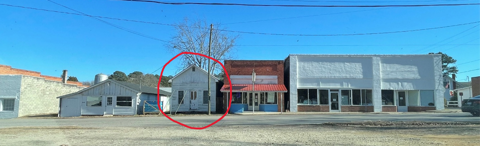 Main Street Stores: Location of the original post office circled in red
