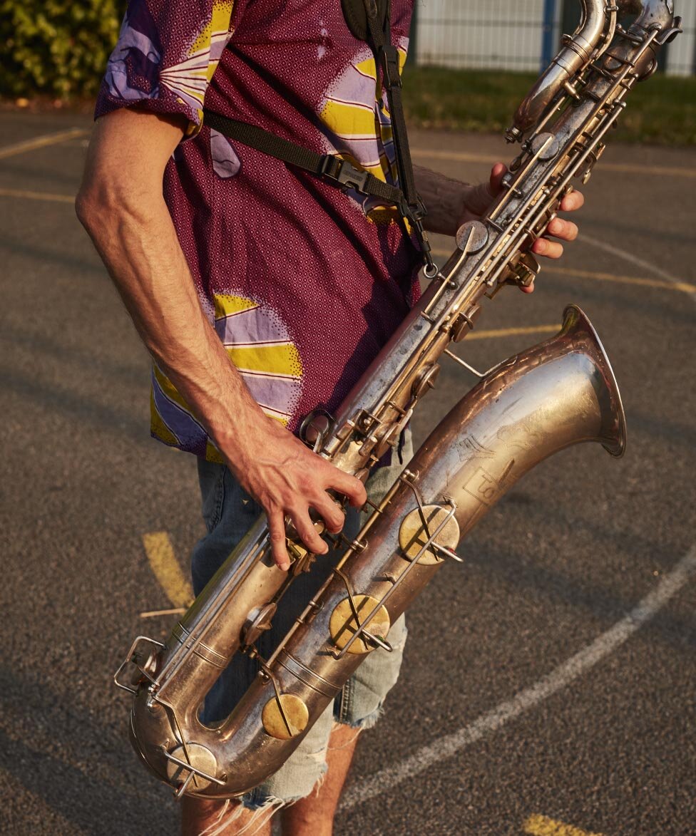  Rehearsal Room by Photographer Jon Enoch. Pictured: Leroy Richardson and his baritone saxophone pictured in East Dulwich, London.  