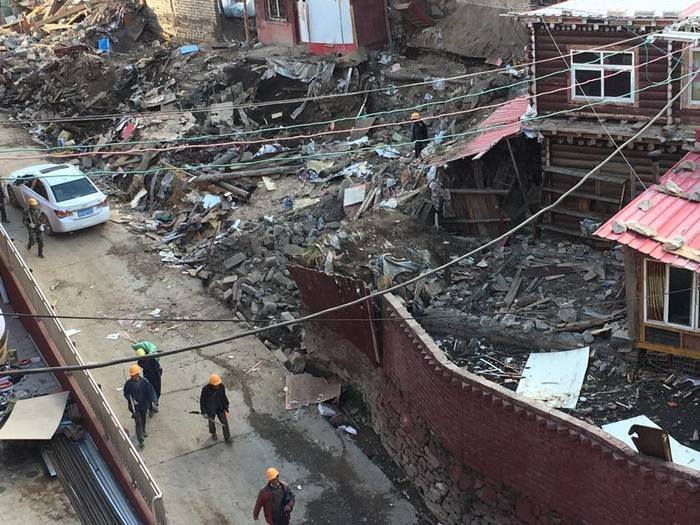 Buildings by the side of one of Larung Gar's main roads after demolition