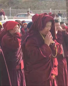 Monks and nuns of Larung Gar praying and crying because of the forced evictions and demolitions of their homes in 2016