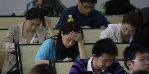 People take part in the civil service examination at Huazhong University of Science and Technology on April 24, 2011 in Wuhan, Hubei Province of China.