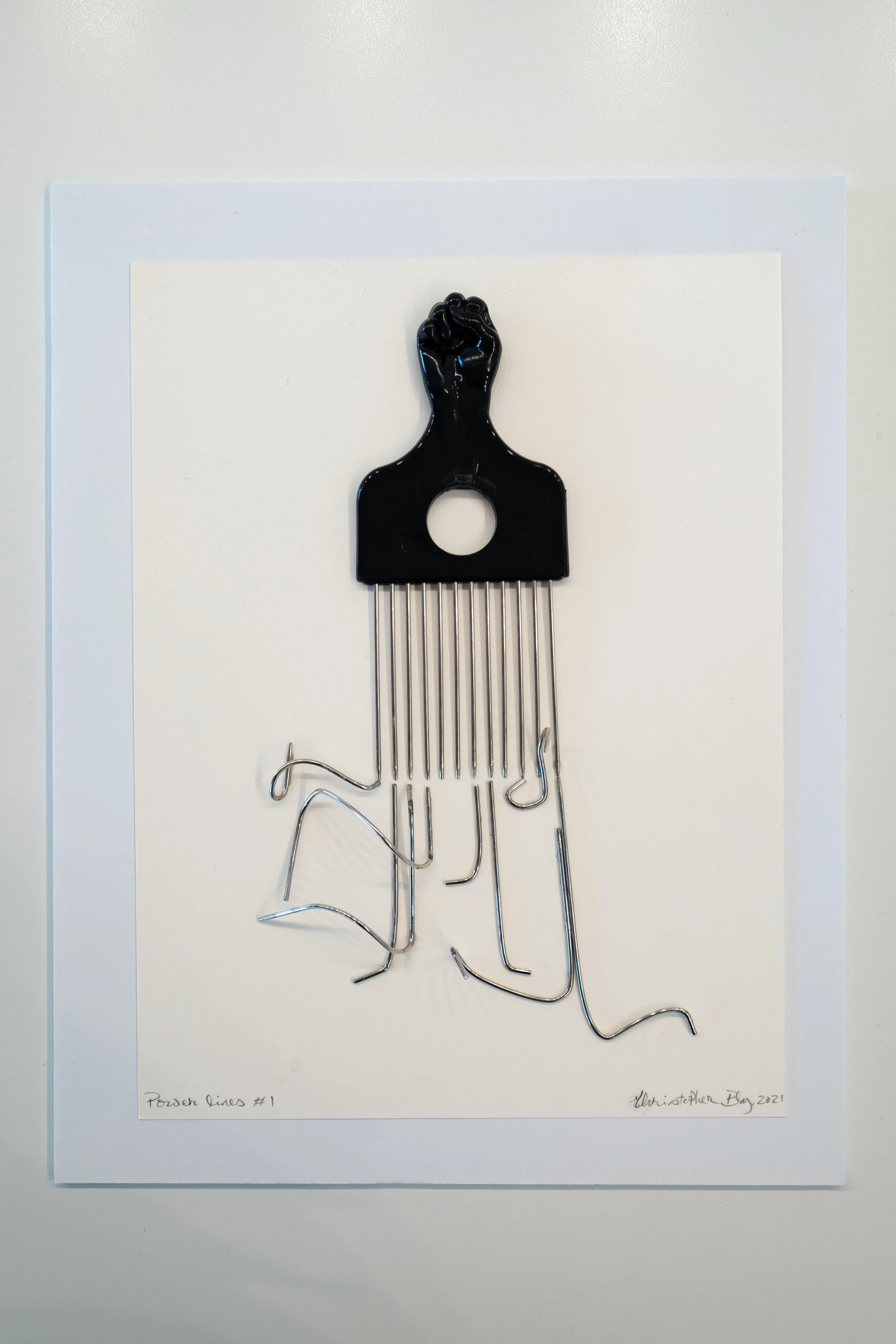  “Power Lines, #1 [unavailable].” Afro Pick, twisted comb teeth, jeweler’s glue, on 140 lb cold press watercolor paper, 2021, Dimensions variable 